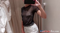 Sexy cutie takes a video of herself in the fitting room of the store