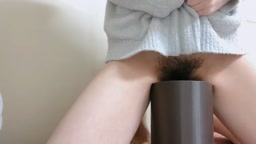 Cute Japanese Girl Pees in a Trash Can