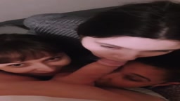 a white phimosis cock receives oral service from 3 beautiful women on the stairs of an apartment