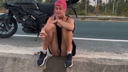 Motorbike girlfriend leaking piss on the roadside