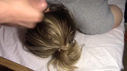 Applying hair gel while she dreams