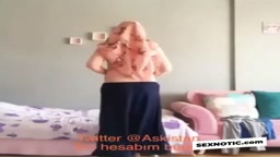 Turkish Arab in Hijab and Turban Performs a Striptease