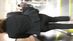 黒パンツスーツOL