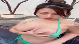 Asian bikini at waterpool