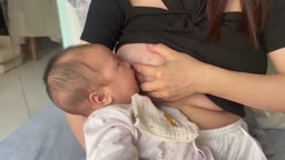 Young mother from JAV breast milk for baby