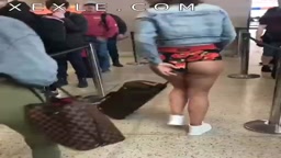 Very short shorts at the airport