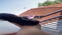 Malang female student has sex on hotel balcony with boyfriend.