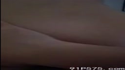 The beautiful wife opens the curtains in Macau and faces you with her ass