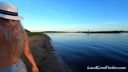 Russian Nudist on the River Shore