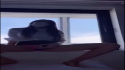 OL美女　ホテルの窓際で