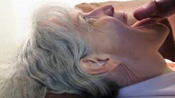 Grey-Haired Granny's Blowjob and Cum-Filled Mouth