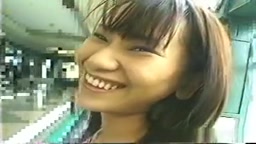 Asian naked on airport travelator