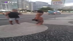 Bare titties out taking a stroll down the street.