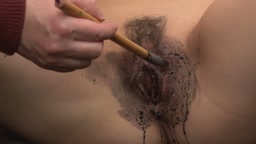 Her vagina and breasts were used as a stamp in front of many people