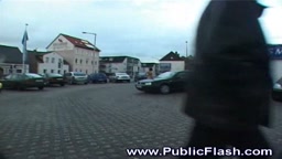 slender nude woman in public walkabout