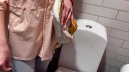 Public Restroom Blowjob with a Mysterious Brunette