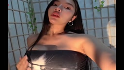 Korean slut showing her tits