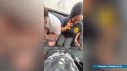 brunette talking to his BF while looking at bulge near her face