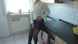 Der Küchenspaß eines deutschen Amateur-Paares