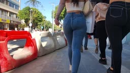 Double Trouble. Two delicious butts walking down the street in tight jeans