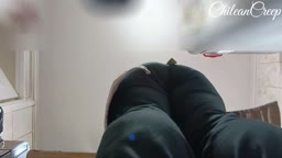 Big ass MILF washing dishes