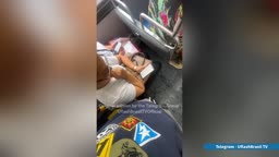 The brave man's tool is on the woman's arm.