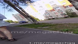 A young butt is exposed in the street.