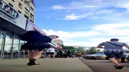 He gets on the bus and shows off his butt.