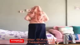 Turkish Arab in Hijab and Turban Performs a Striptease