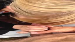 She stuck her head out of the car and started giving a blowjob