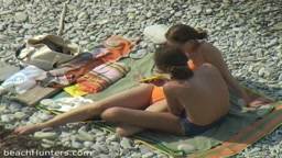 Nude beach couple