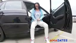 Masturbating bringing herself to orgasm in the Parking lot