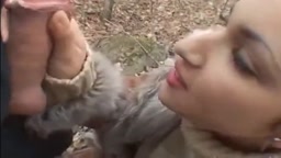 Girl in fur coat give blowjob in forest