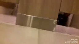 Malay Office lady caught pissing while washing her pussy with a bidet 1